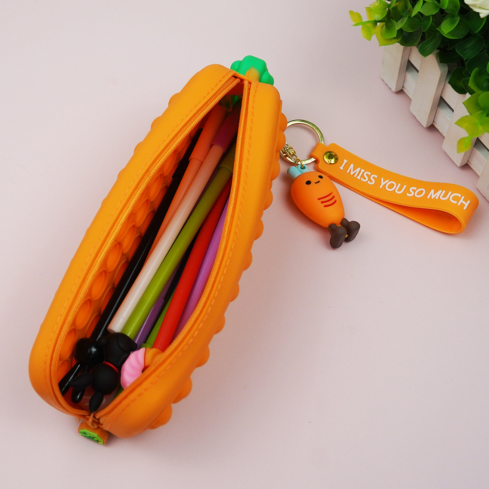 Find Silicone Carrot Pencil Case Stress Relief Girls Boys Pen Box Office School Study Storage Bag Stationery Pencil Case for Sale on Gipsybee.com with cryptocurrencies