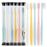 Caja de almacenamiento para un solo tubo de cepillo de dientes portátil de color claro y vaso de dientes para viajes en el baño