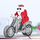 Bożonarodzeniowa trójwymiarowa kartka z wesołym Świętym Mikołajem na motocyklu jako prezent na Święta Bożego Narodzenia