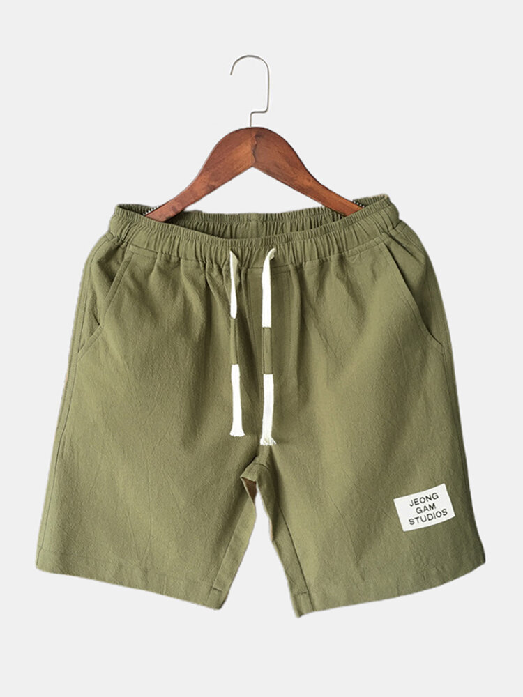 Mannen katoen effen kleur kleine tag koord casual shorts met zak