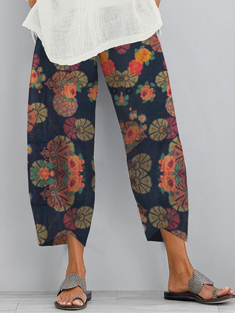 Etnische bloemenprint Elastische zijzak Onregelmatige casual broek voor dames