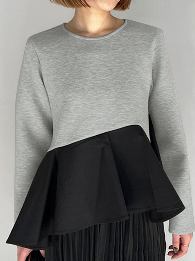 Contrasterend patchwork asymmetrisch sweatshirt met lange mouwen en ronde hals