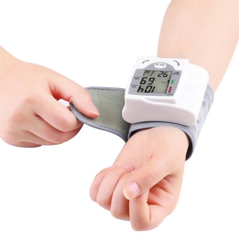 

Portable Automatic Digital LCD Display Wrist Blood Pressure Monitor Device Heart Beat Rate Pulse Meter Measure Tonometer