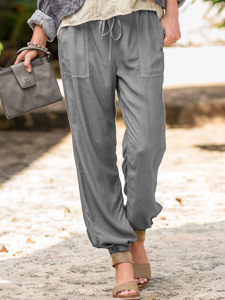 Vrouwen effen kleur zak losse elastische taille broek